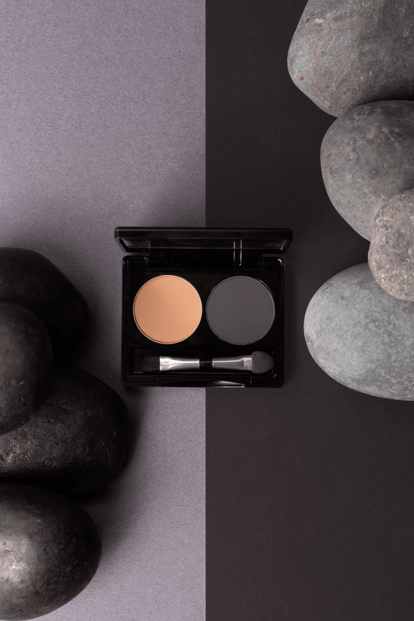 Brow Duo Palette for flawless eyebrow shaping and defining, featuring two harmonizing shades for natural or dramatic looks. Includes ingredients like Talc, Mica, and Ethylhexyl Palmitate, and usage tips for perfect brows. Made in Canada, net weight 5g/0.18 us oz.