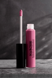 NARCISSE BEAUTY SECRET Lip Gloss for glossy, hydrated lips with a luxurious formula. Offers high-shine finish and nourishing ingredients for moisturized lips. Perfect for both subtle and bold looks, adding glamour to your lip makeup.